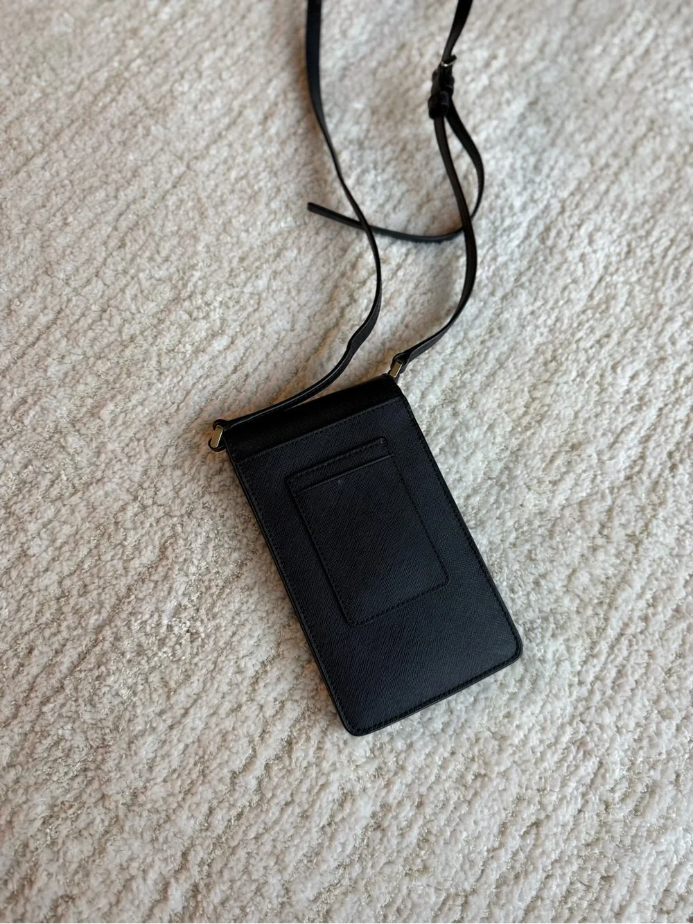 kate spade black leather crossbody phone pouch with gold logo